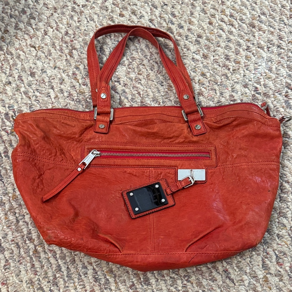 Beautiful red leather L.A.M.B. purse.  In very good condition (see photos). EUC.